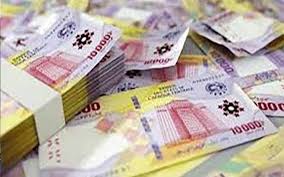 Liasses de billets de 10 000 FCFA, la monnaie de la zone CEMAC.